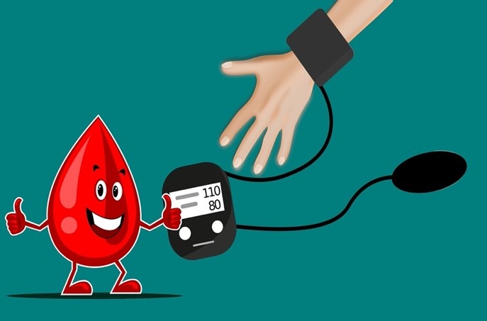 IMAGE 3: Image depicting a cartoon drop of blood next to a blood pressure monitor attached to a patient. 