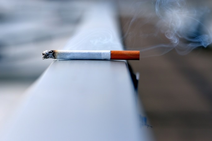 Cigarette lying on a wall
