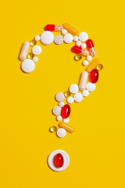 Image of drugs in a question mark shape.